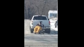 Woman in Wheelchair Gets Towed by a Pickup Truck
