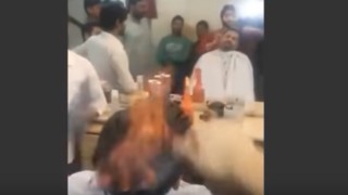 Barber Sets Customer Hair on Fire and the Dude Has No Reaction