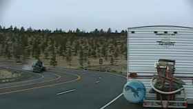 Police Dash Cam Catches Scary Semi Rollover on Highway
