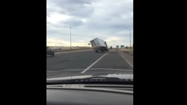 Tractor Trailer Gets Blown Over on the Highway by 80 MPH Winds